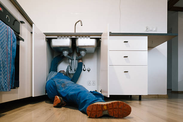 Professional Drain Cleaning technician working in Washington, MI